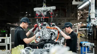 The Xiaomi SU7 rolling off the production line at the new plant in Beijing.
